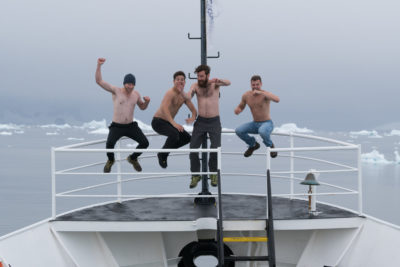 Shirtless on deck in Antacrctica
